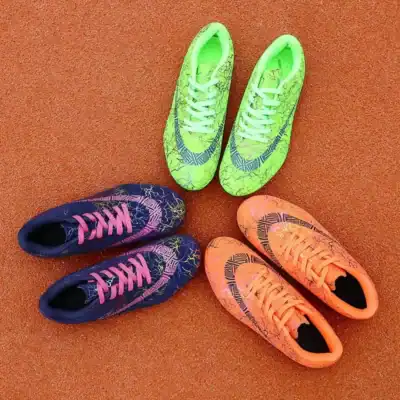 Green And Orange Track Spikes